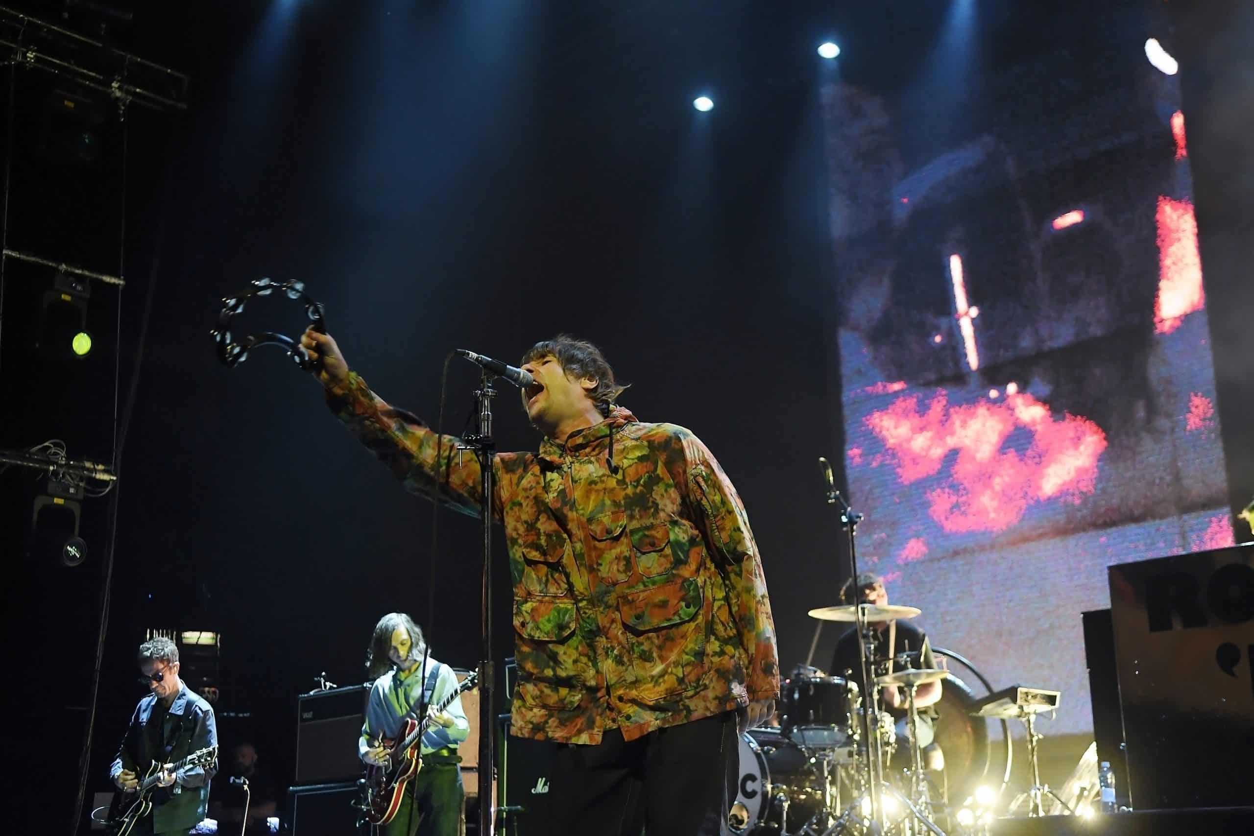 Liam Gallagher performing on stage