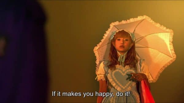 Momoko wears a pastel blue Lolita coord. The caption reads: "If it makes you happy, do it."