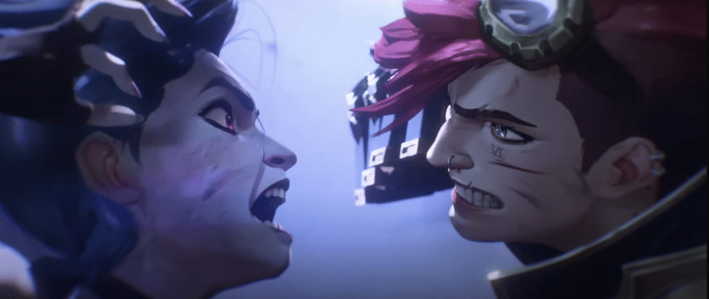 A pink-haired girl swings at a blue-haired girl's face.