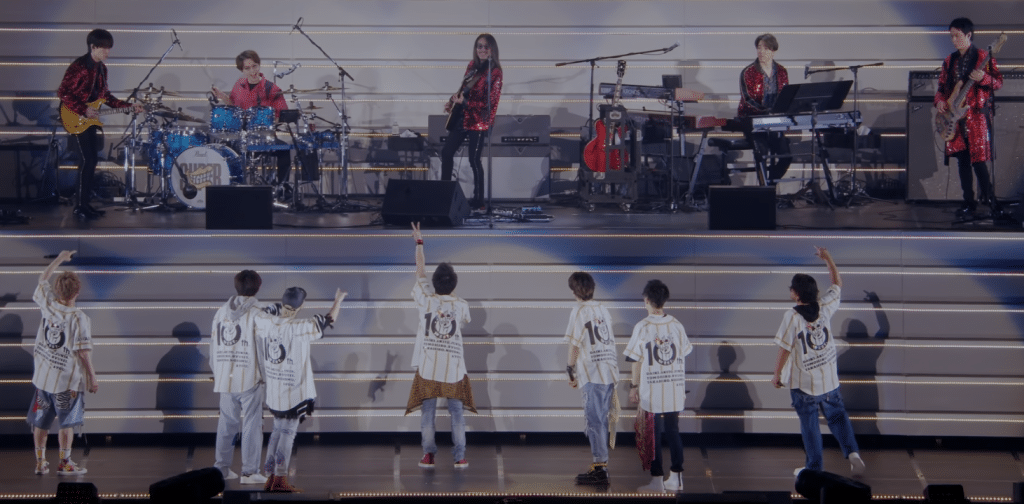 Band SUPER EIGHT plays upstage group WEST.