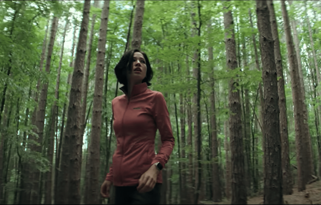 Iris (Kelsey Asbille) on the run in Don't Move (2024).