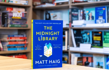 Photo of the blue cover of The Midnight Library