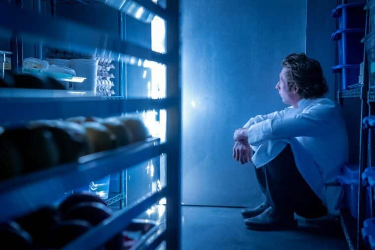 Carmy trapped in walk-in fridge during opening night of The Bear, leading to a dramatic panic attack scene