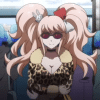 Junko Enoshima standing in sunglasses and a cheetah print dress