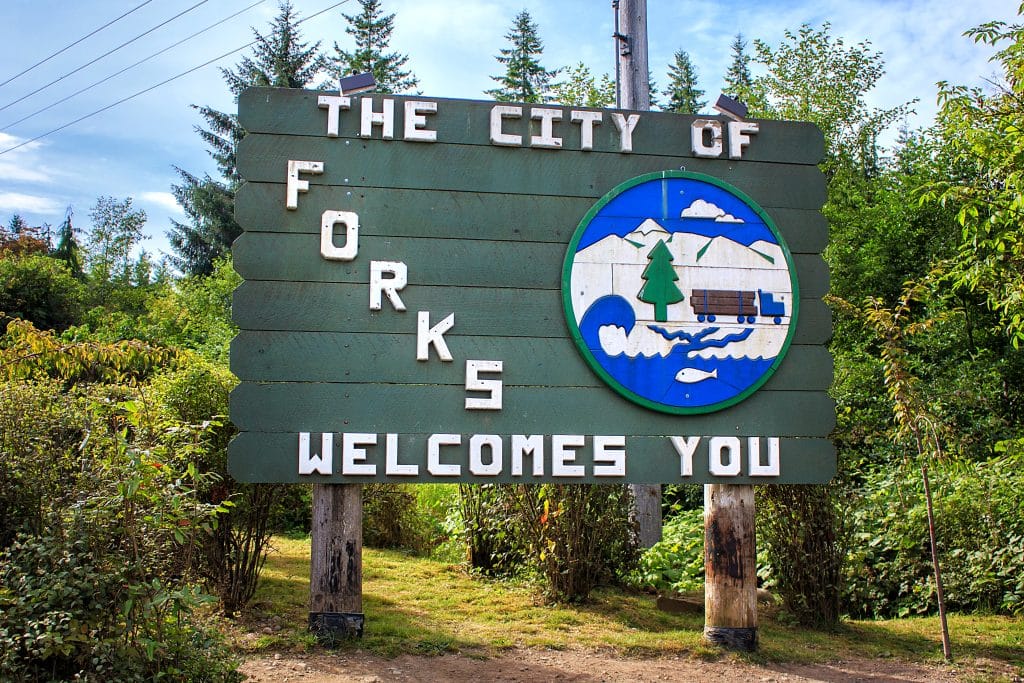 Sign that says "The city of Forks welcomes you"