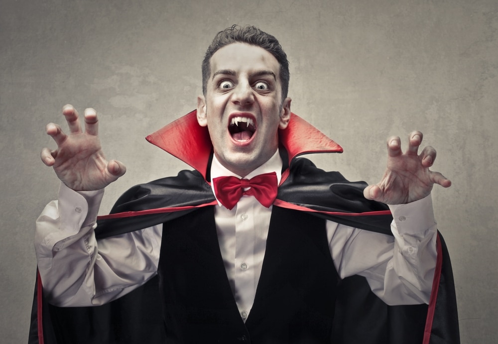 A man dressed as a vampire for Halloween. A timeless costume.