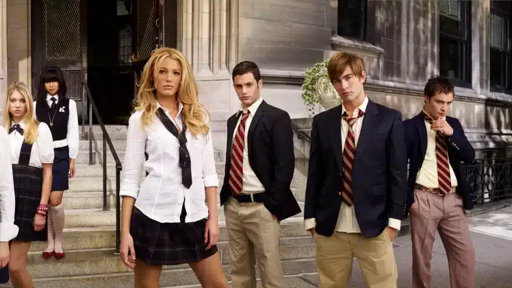 Promotional still from the TV show Gossip Girl, depicting the main characters in their iconic school uniforms