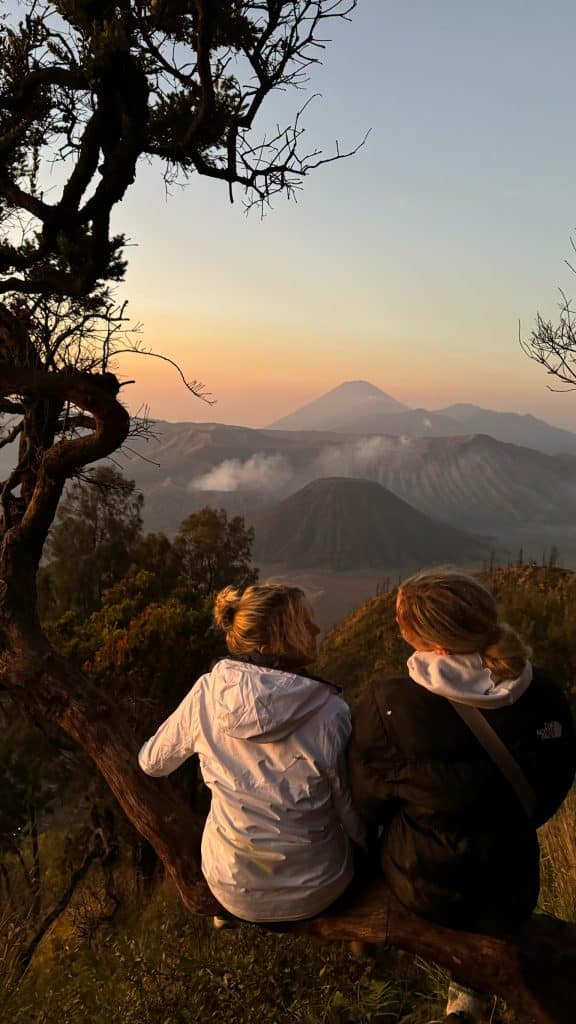 My friend Ciara and I on a mountain facing a volcano