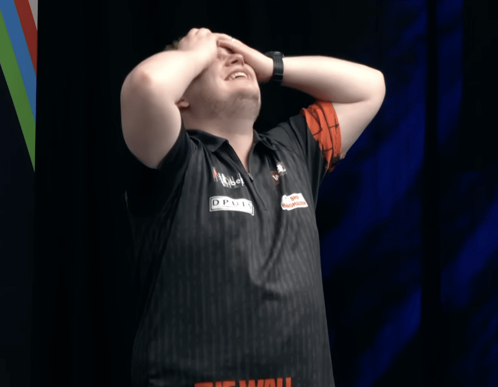 Schindler with his head in hands