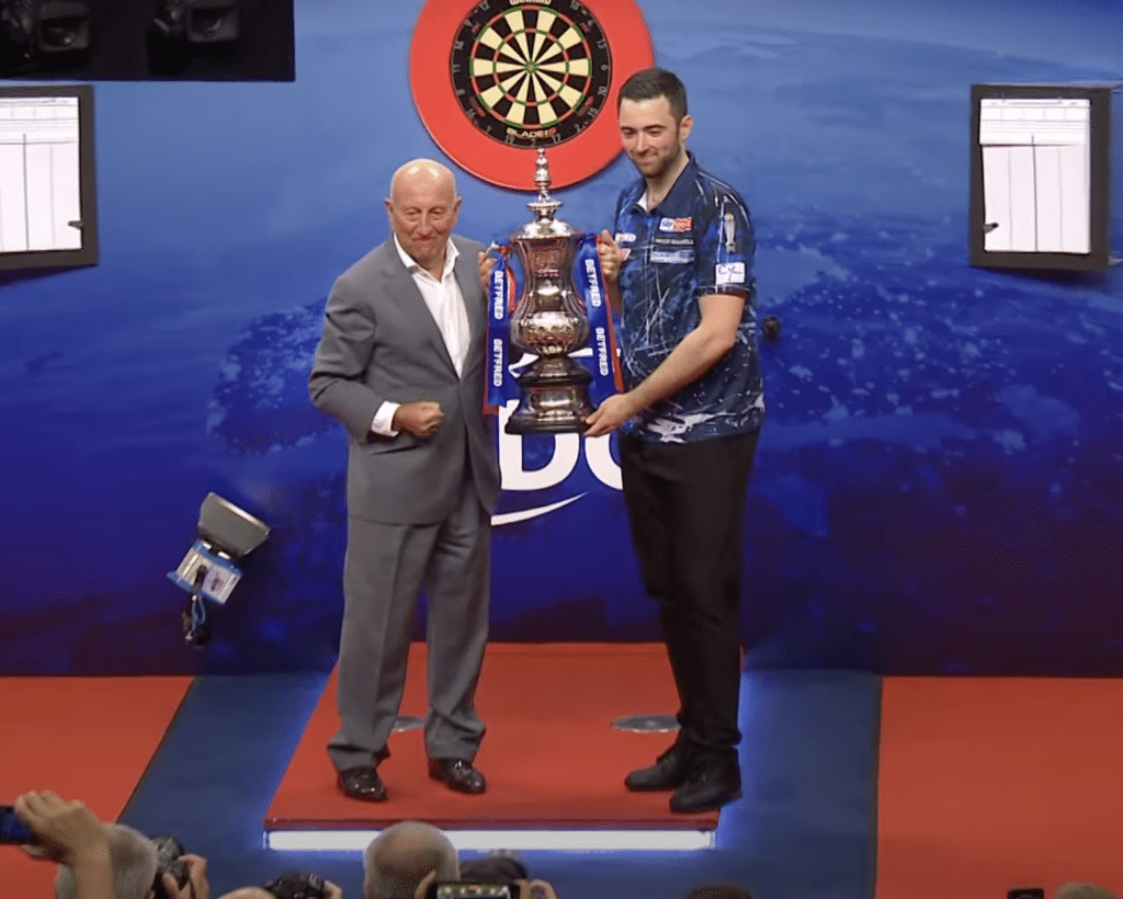 Humphries holding the trophy