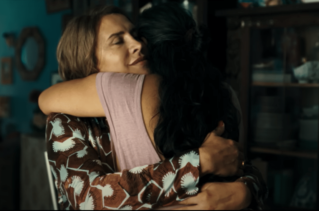 Emilia embracing a woman in crisis. Credit: Netflix