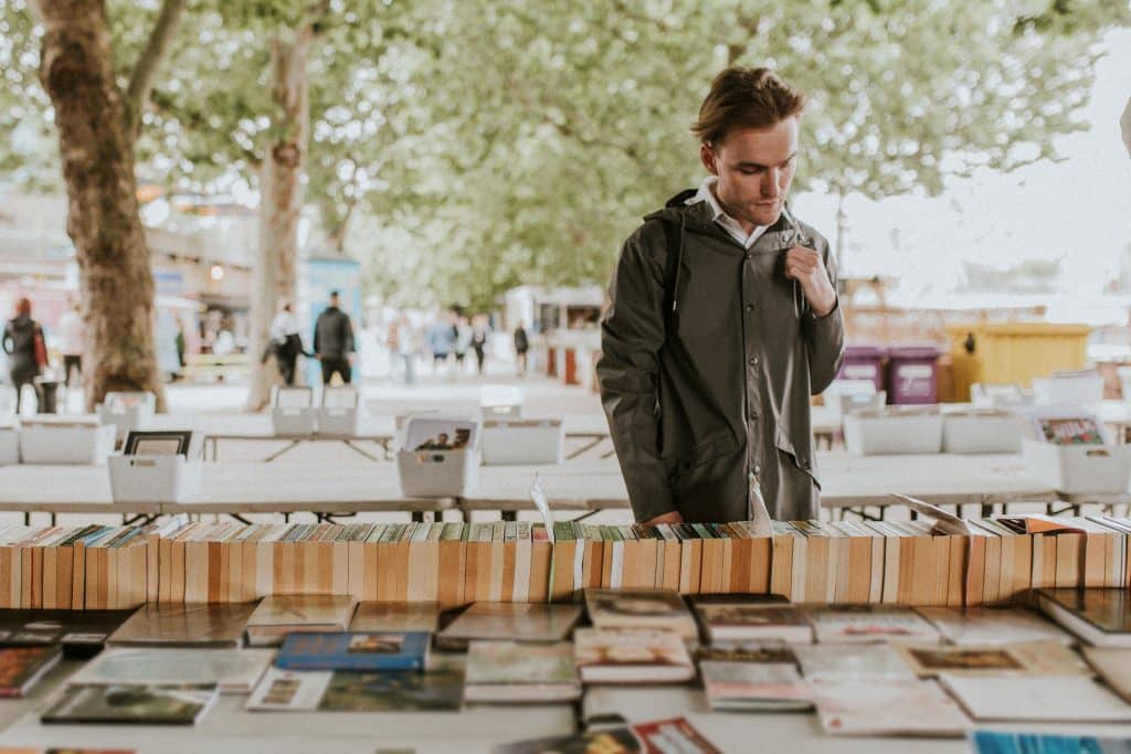 Man looking at secondhand books