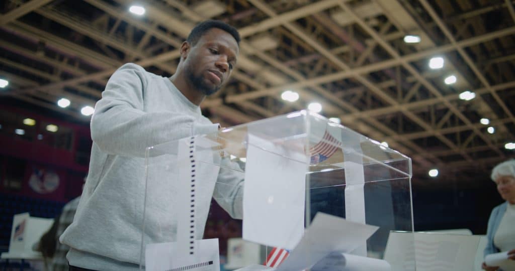 American voters come and put bulletins. Credit: Shutterstock/Frame Stock Footage