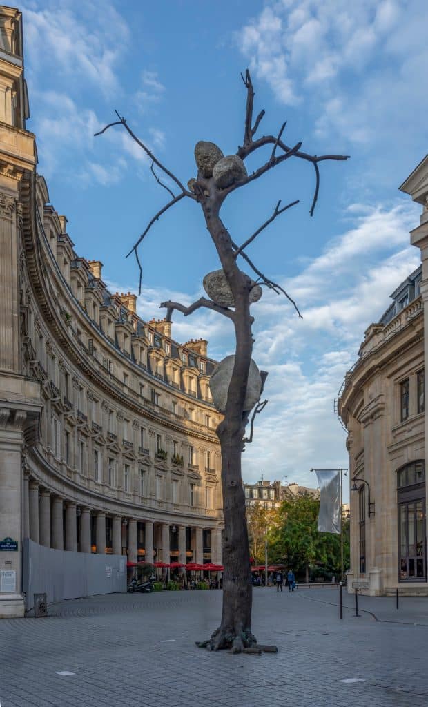 Statue of a tree and stones