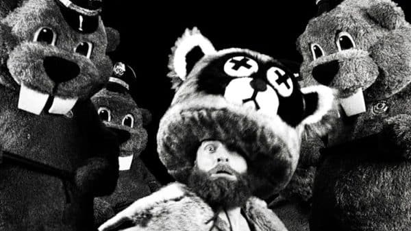 Ryland Brickson Cole Tews surrounded by Beavers. Credit: VinegarSyndrome.