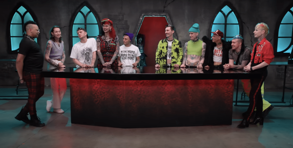 A screenshot of the trailer for Dragula season 6 shows the competitors preparing for their next challenge.