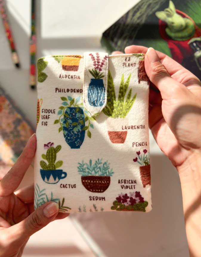 Product picture of a book/kindle cover with a plant pattern