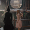 A still image of Elphaba and Glinda at the end of Wicked Part 1