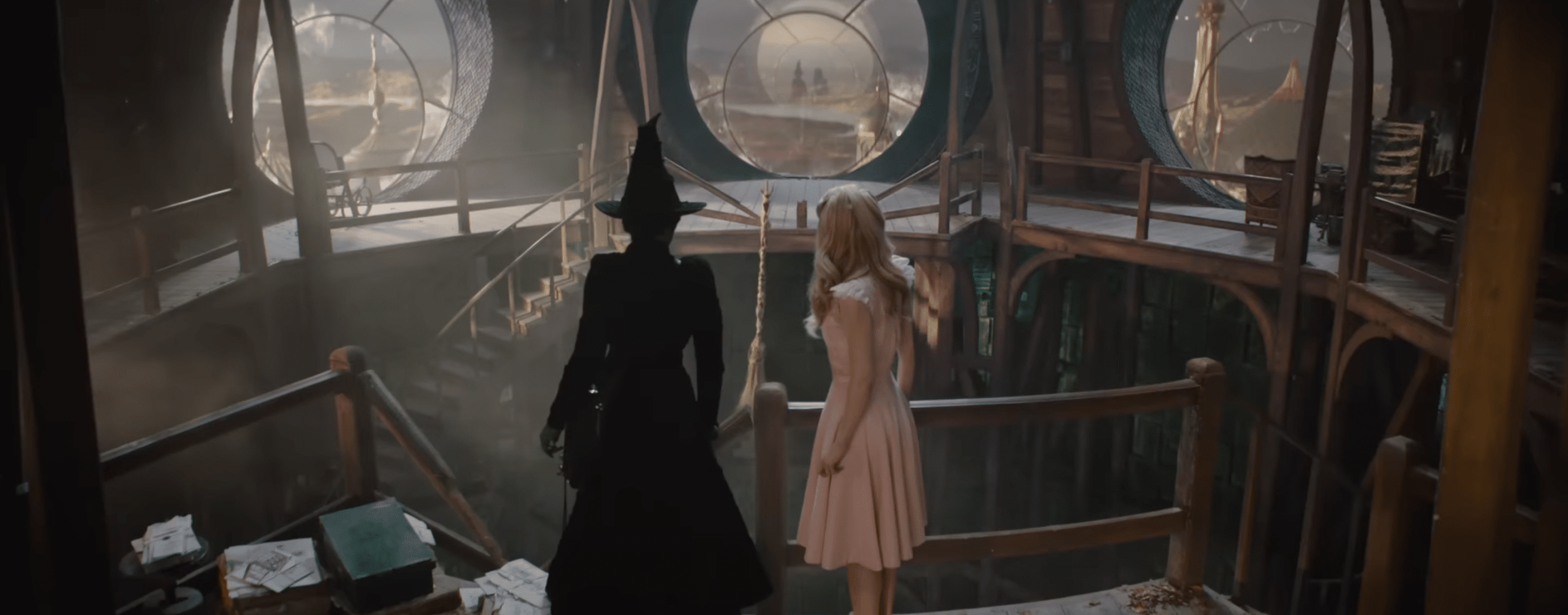 A still image of Elphaba and Glinda at the end of Wicked Part 1