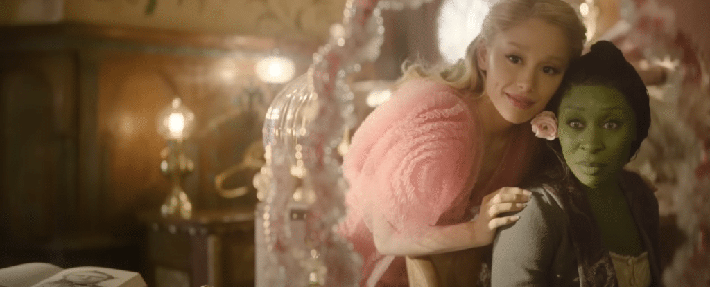 Still image of Ariana Grande as Glinda and Cynthia Erivo as Elphaba