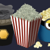 On the left is the Dune popcorn bucket. In the middle is a regular red and white striped popcorn bucket with money on it. On the right is a minions-themed popcorn bucket with popcorn in it.