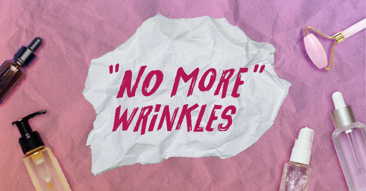 An image with skincare products laid out on a table. In the middle is a piece of paper that reads "No more wrinkles"