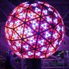A bright, colorful image of the Times Square New Year's Eve ball.