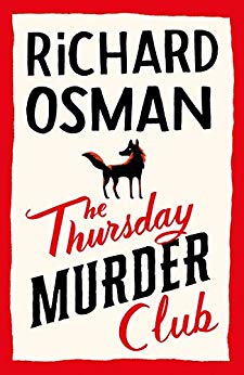 photo of a book cover. It has a red border, the authors name is at the top in big black writing, below is a cartoon depiction of a black fox, then below is the title of the book with 'the thursday' and 'club' in red cursive writing, and 'murder' in bold black writing