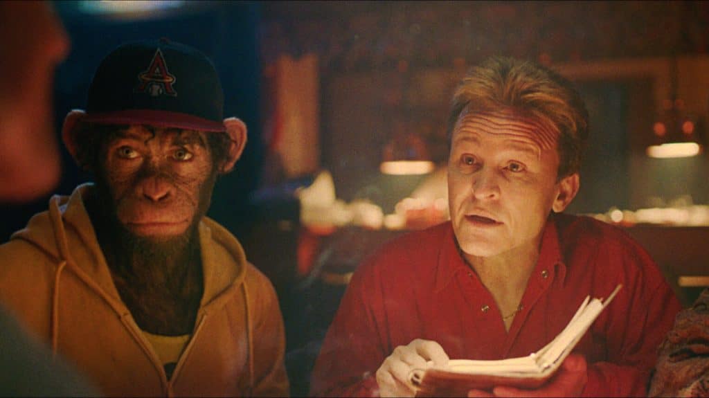 Robbie Williams and Damon Herriman talk shop in Better Man. Credit: Paramount Pictures.