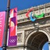A picture of the Paris 2024 Olympic emblem with L'arc de Triomphe in the background. Credit: Shutterstock/Noriox