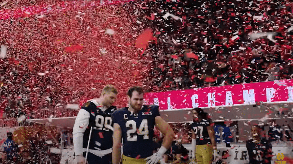 Emotional Notre Dame Players watch Ohio State celebrate their national championship win.