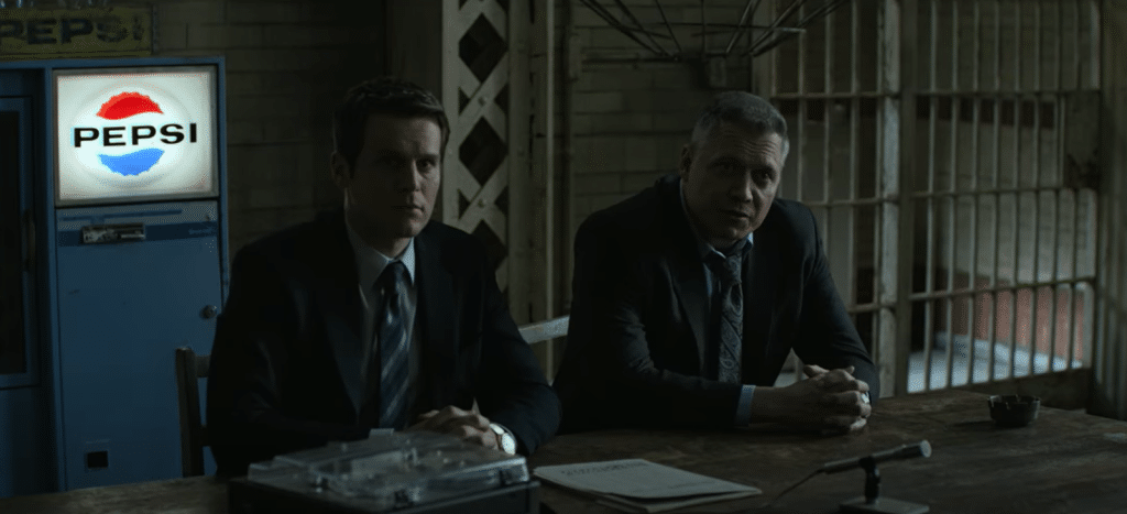 Mindhunter stars Jonathan Groff (left) and Holt McCallany in a cancelled fan-favorite show. Credit: Netflix