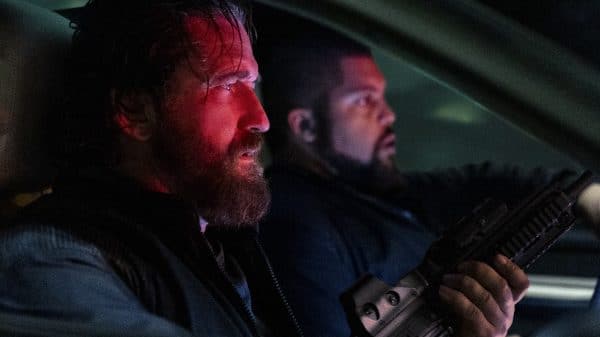 Big Nick (Gerard Butler) and Donnie (O'Shea Jackson Jr.) in a still for "Den of Thieves 2: Pantera."