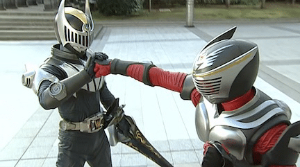 Kamen Rider Ryuki and Kamen Rider Knight fight one another.