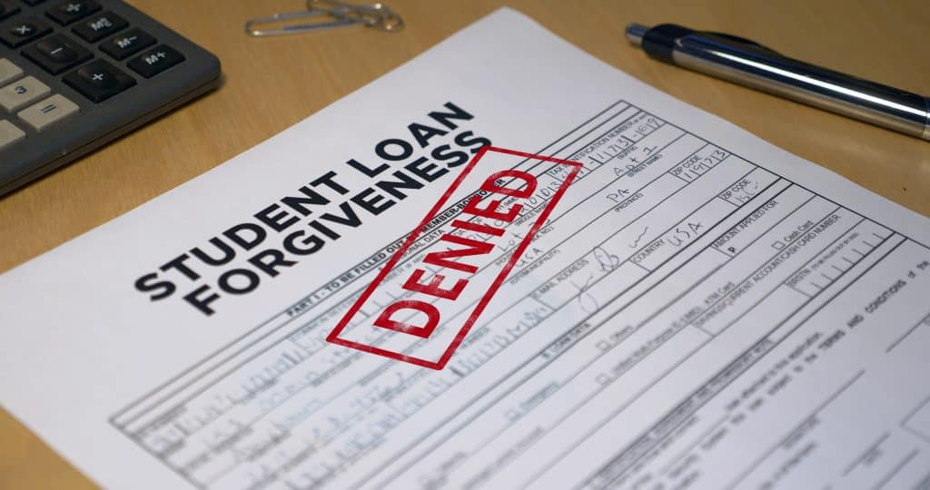Less students may be approved for student loan forgiveness under the Trump Administration. Source: Shutterstock/Orlowski Designs