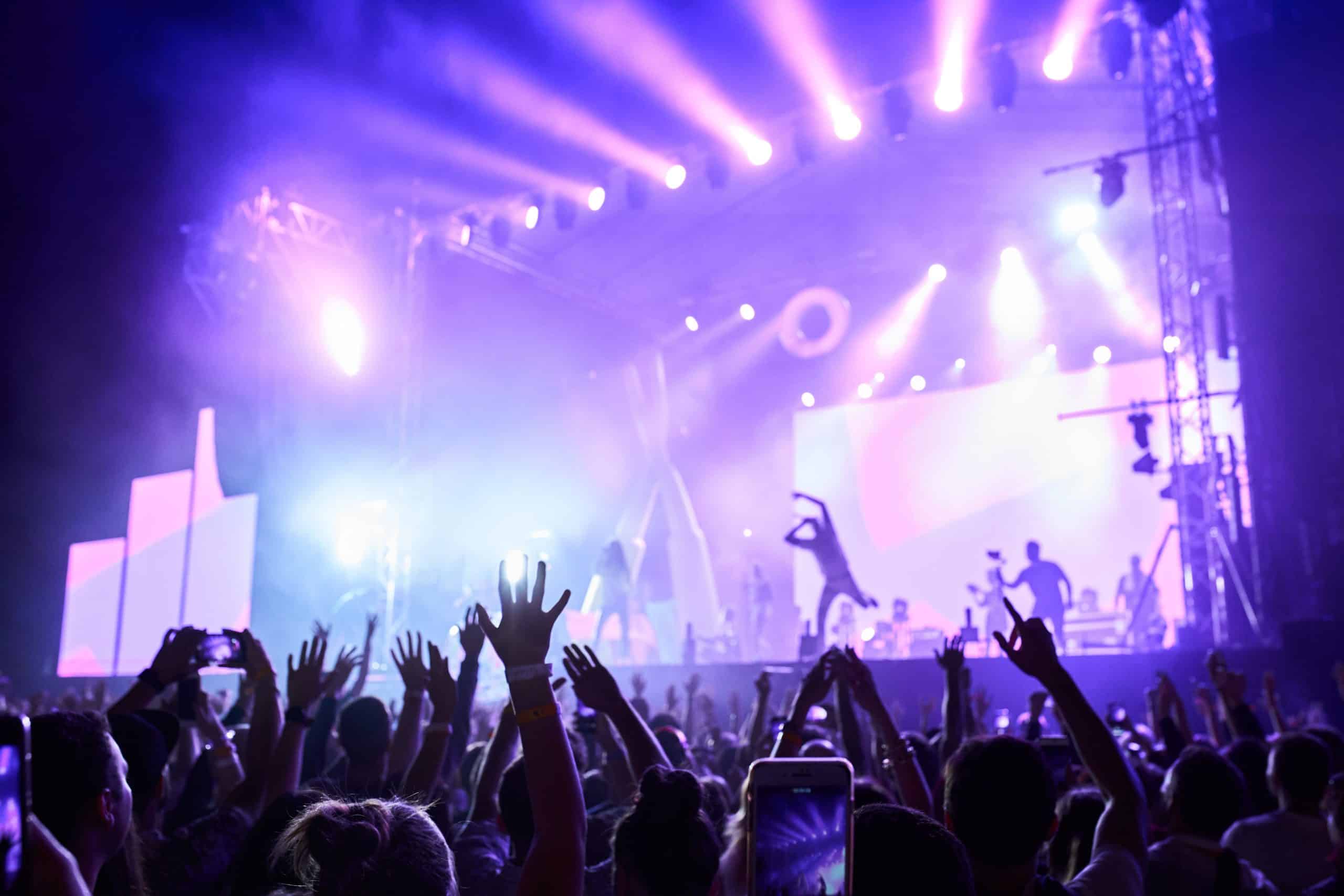 Rihanna 2026 Tour concert image with fans cheering