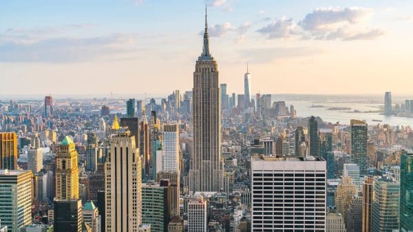 View of NYC landscape with empire state in the middle with clear sky