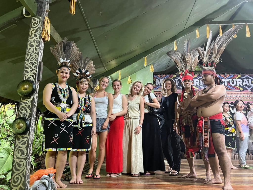 a photo of the locals dressed as the traditional tribe