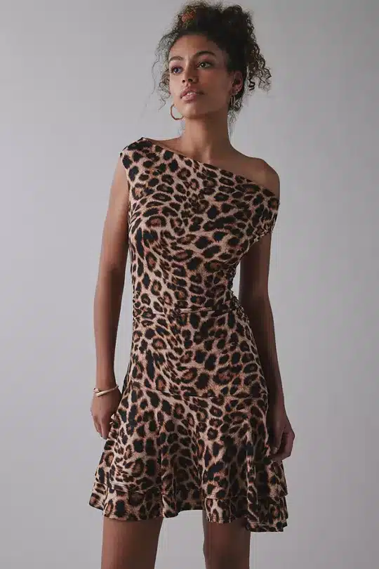 UO Happy Hour Asymmetrical Off-The-Shoulder Mini Dress in leopard print.