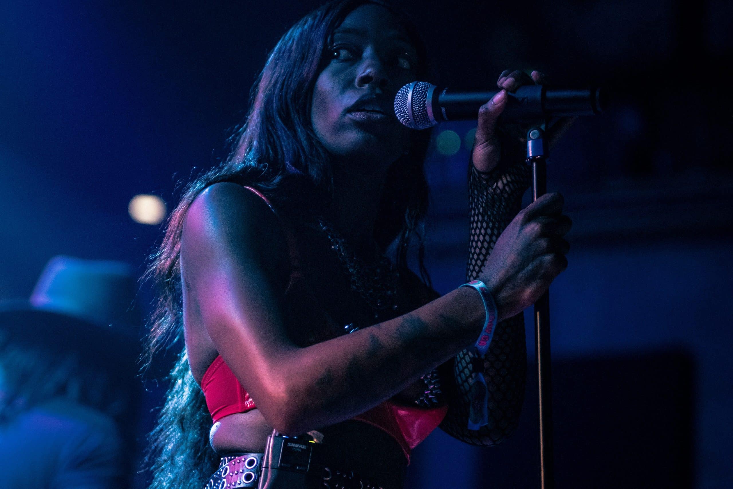 A photo of TeZATalks singing at a music show.