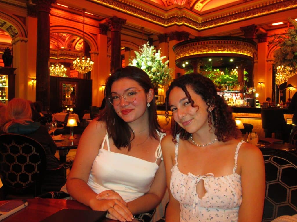 Image of the co-founders of The Gently Mad Literary Magazine, Julie and Serafina, pictured smiling together.