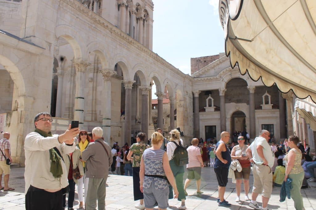 Tourists wandering through Diocletian's Palace.