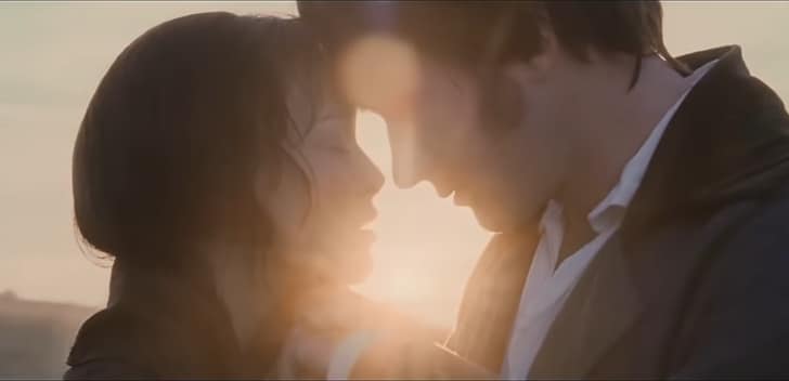 Elizabeth Bennet and Mr. Darcy kiss as the sun rises.