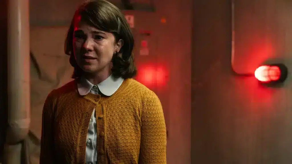 Still image of Jess Garbor as Janet in Season 2 of "School Spirits."