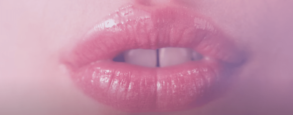 A close up shot of a woman's (Sue's) lips