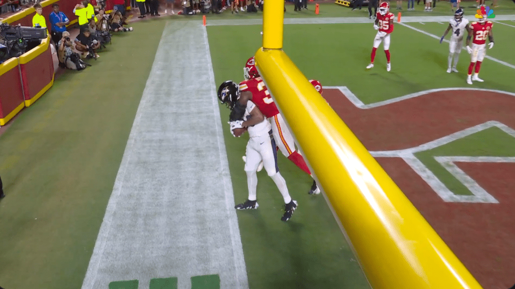 Ravens' NFL player Isaiah Likely appears to make a touchdown catch, but his toe is just out of bounds.