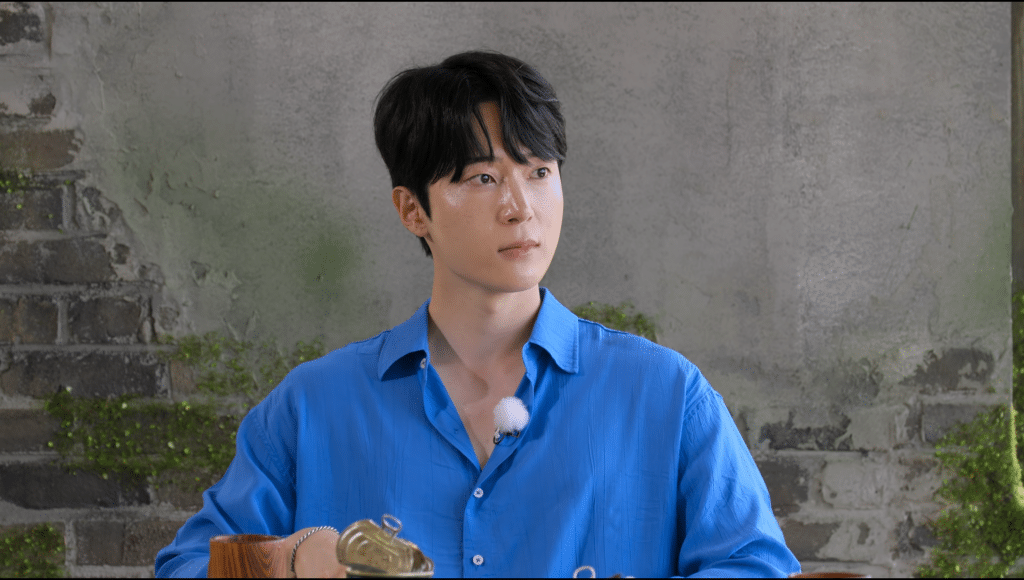 Kook Dong-ho in flashing blue button up