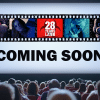 A theater filled with viewers look at a screen filled with five horror movie images and the words "Coming Soon."