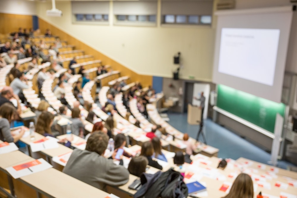 Defocused image of audience at a conference hall
