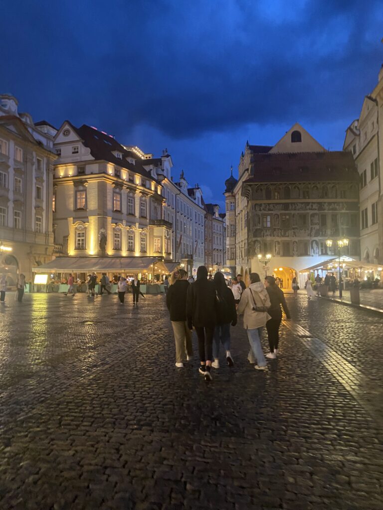 Enjoying the nightlife in Prague's Old Town Square. 